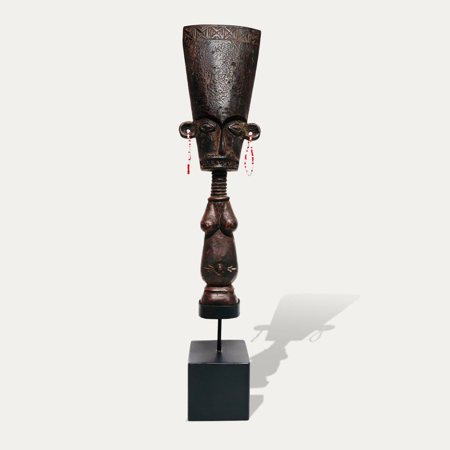 African Statue With Beaded Earrings On Stand