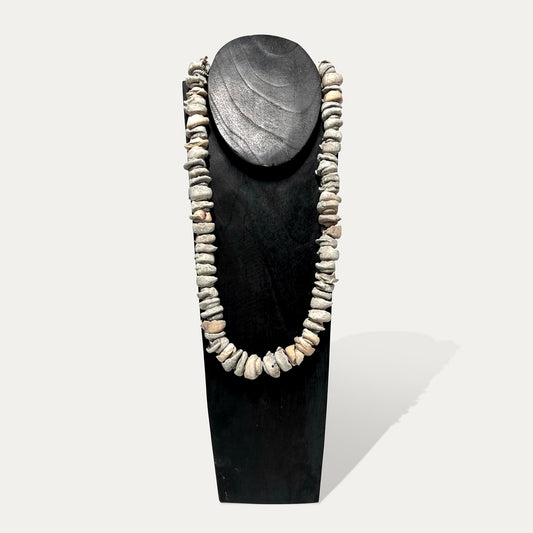 Fossil Necklace from Papua on Stand